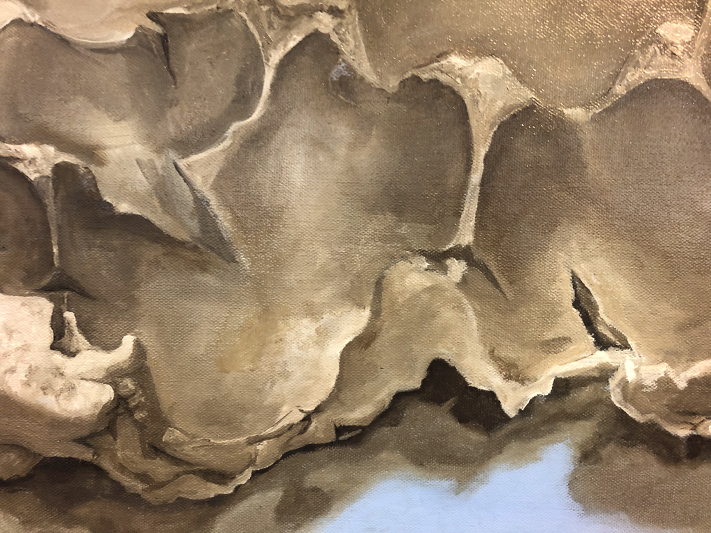Close up of oils piece.